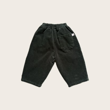 green corduroy trousers with single back pocket