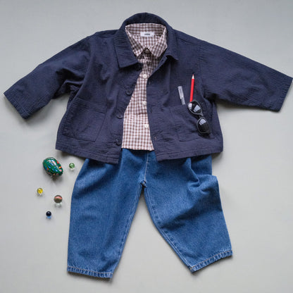 Children's nay blue chore jacket, brown check shirt and barrel leg jeans 