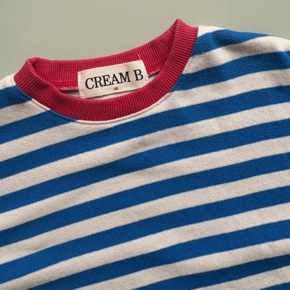 red contrast neck detail on blue and white striped t shirt