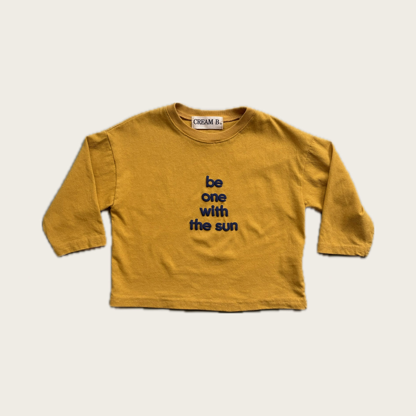 mustard yellow long sleeve t shirt with blue be one with the sun text – Village concept store