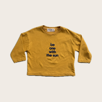 mustard yellow long sleeve t shirt with blue be one with the sun text – Village concept store