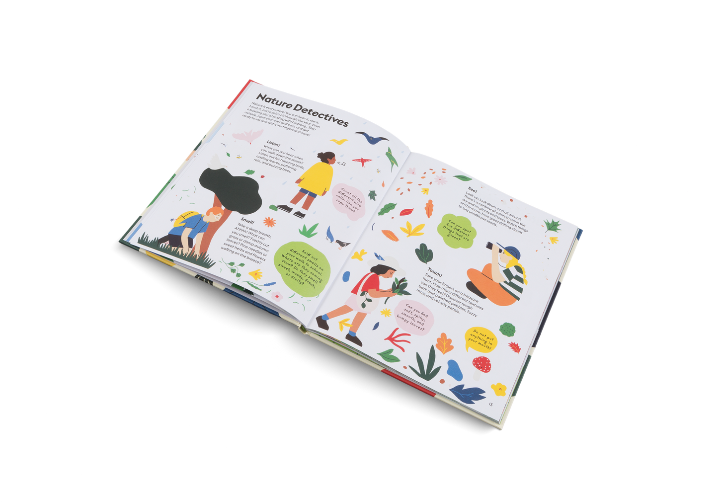 Open pages of Let’s Play Outdoors picture book showing illustrated scenes for kids